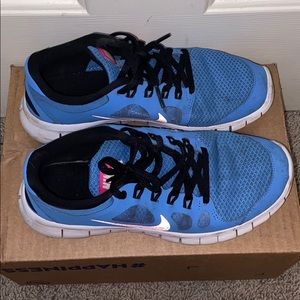 Blue and Pink Nike Free Runs